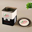 black and white tea tin